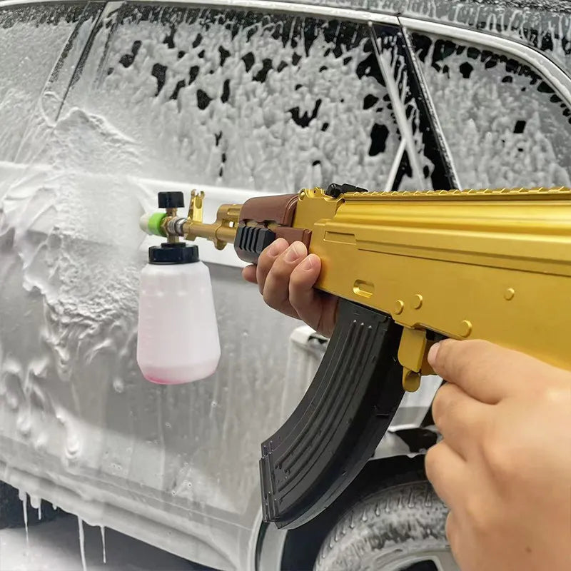 AquaForce Gold foam cannon spraying snow foam on white SUV